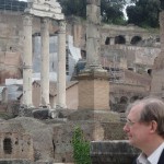 Examining a seagull on a pillar in the Roman Forum